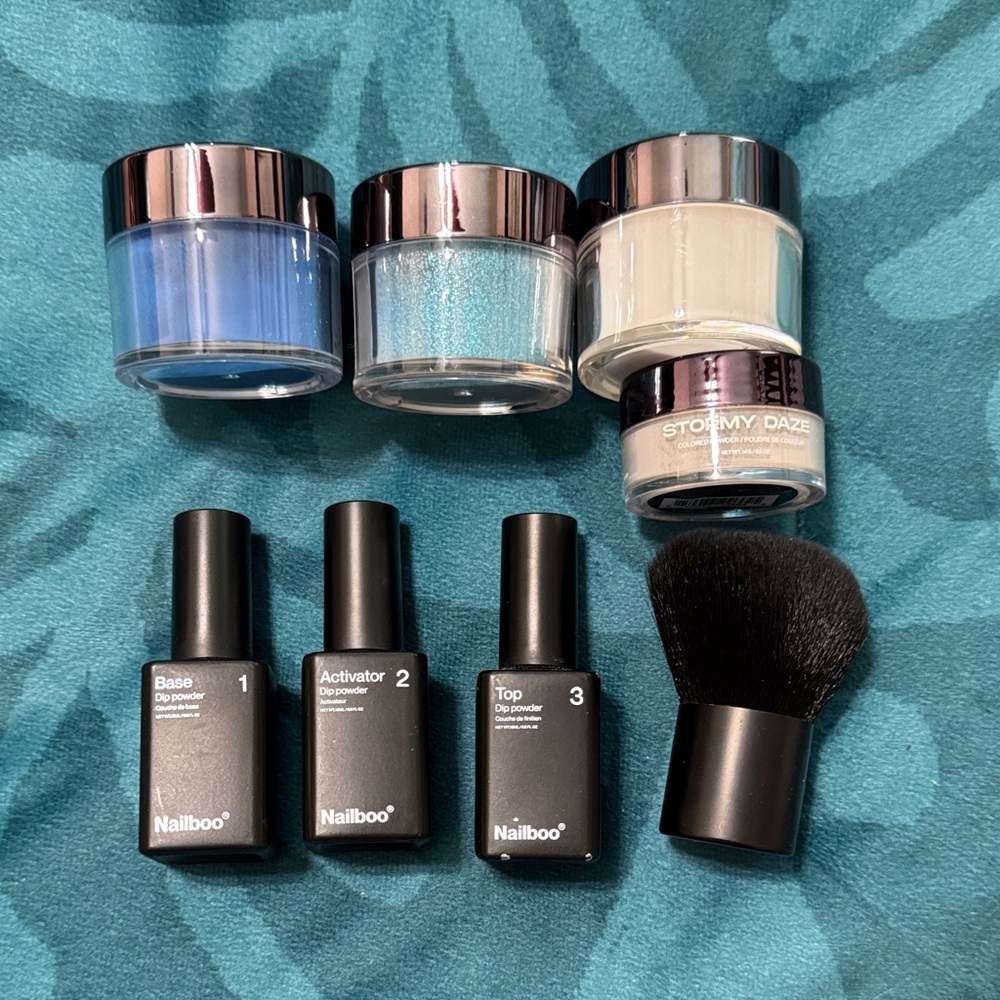 Dip Powder Kit with build powder and 3 colors.
